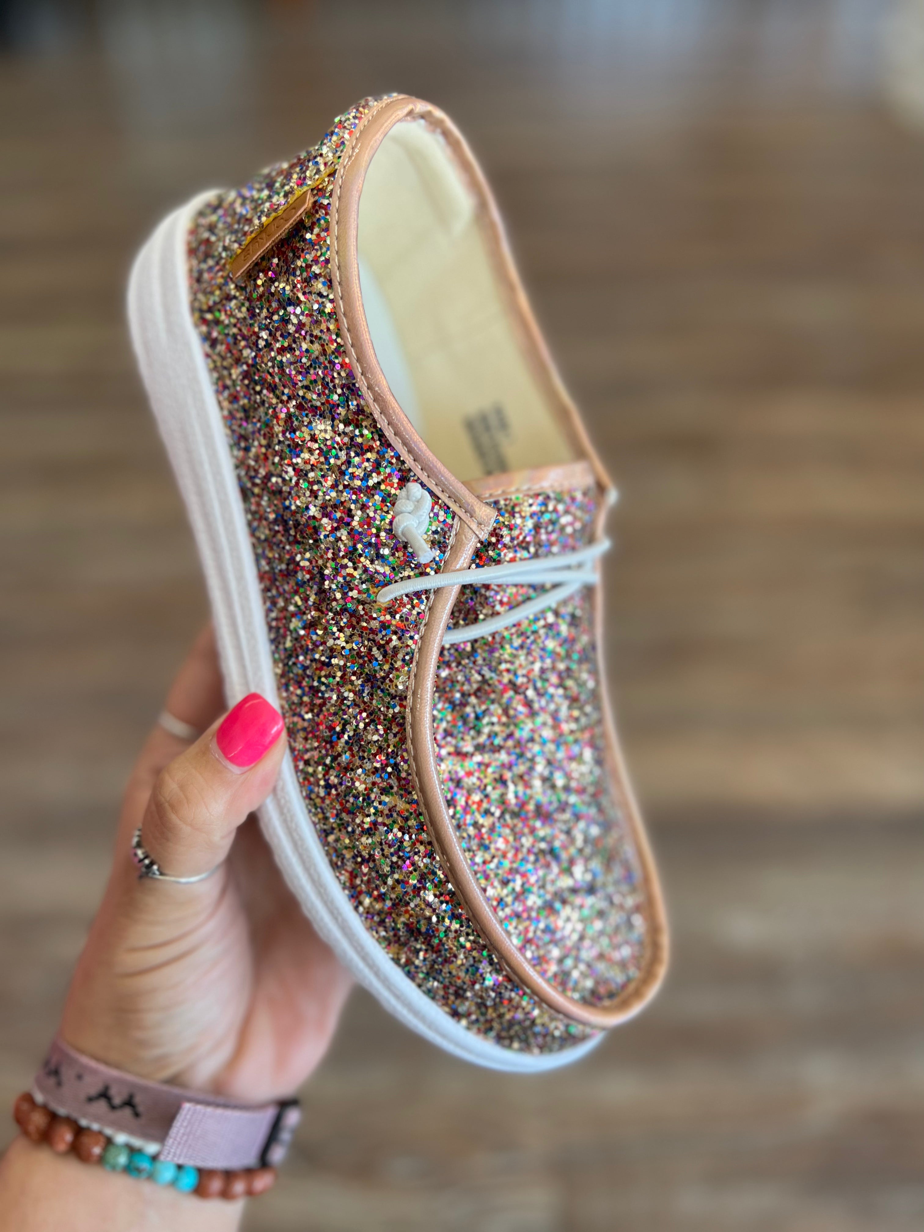 Gold sparkly slip on top shoes