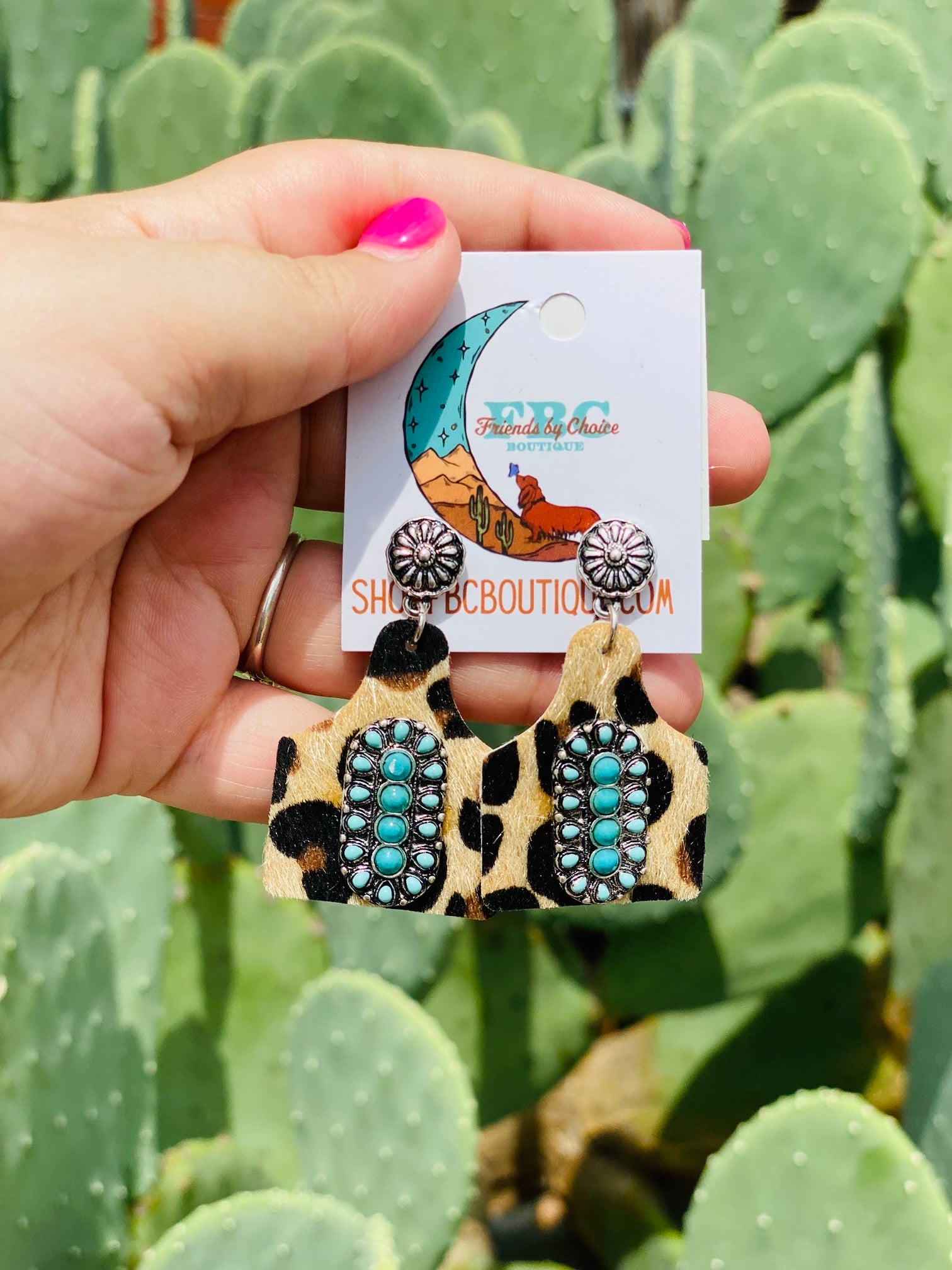 Well Rounded Turquoise Oval Leopard Dangle Earrings