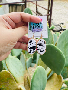 It Ain't Hard To Find Black White Cow Print Leather Earrings