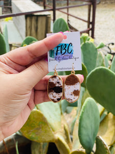 It Ain't Hard To Find Brown Cow Print Leather Earrings